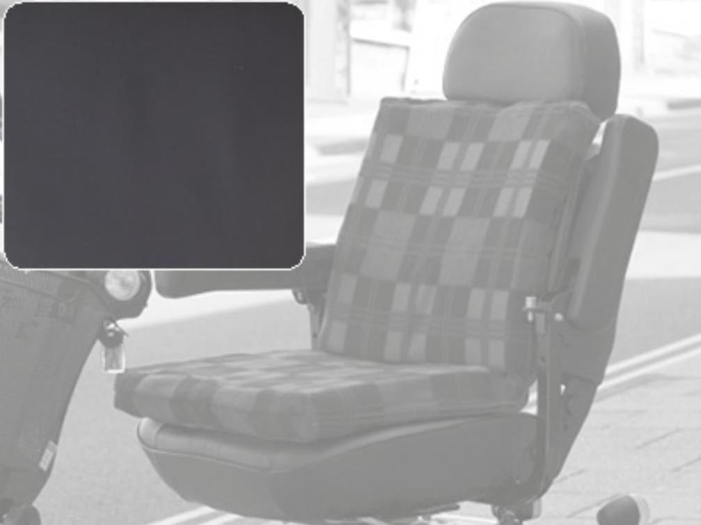 a black and white photo of a reclining chair